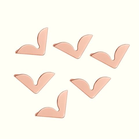 Esquinero curvo oro rosa 15mm x 50 und